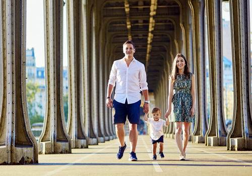 Happy family of three enjoying their vacation in Paris, France
